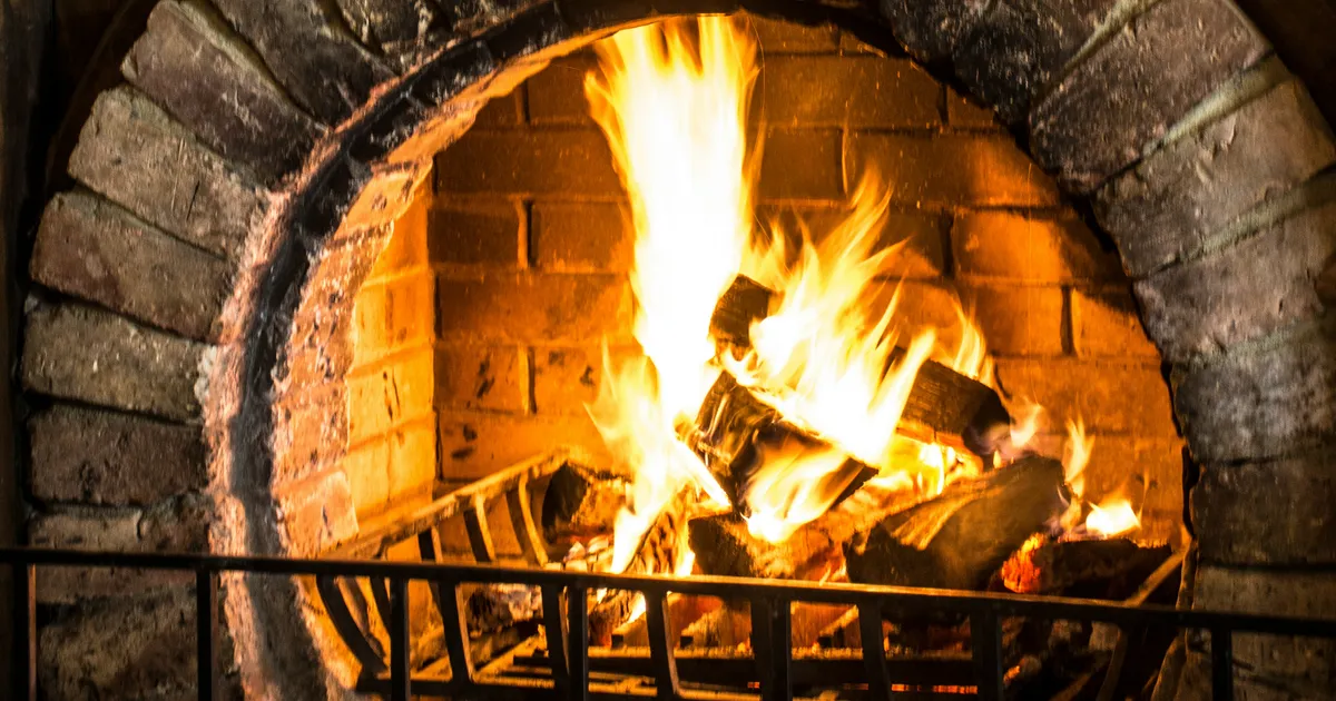 Refractory firebrick lining inside a fire pit compared to cracked standard concrete from thermal cycling