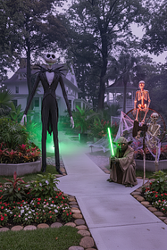 A very tall Jack Skellington (from The Nightmare Before Christmas), wearing his pinstripe suit an...