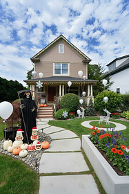  Generate a Halloween winner Christmas landscaping design b, include pumpkins,  balloons, grim re...